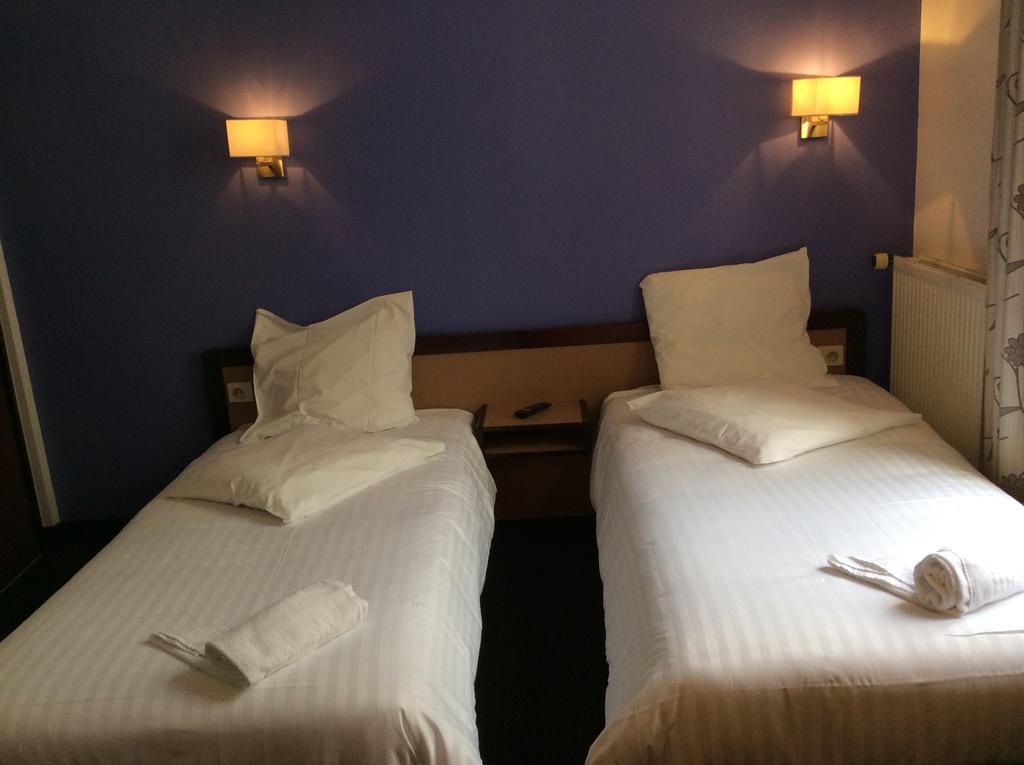 Hotel De La Place Malakoff Pokoj fotografie