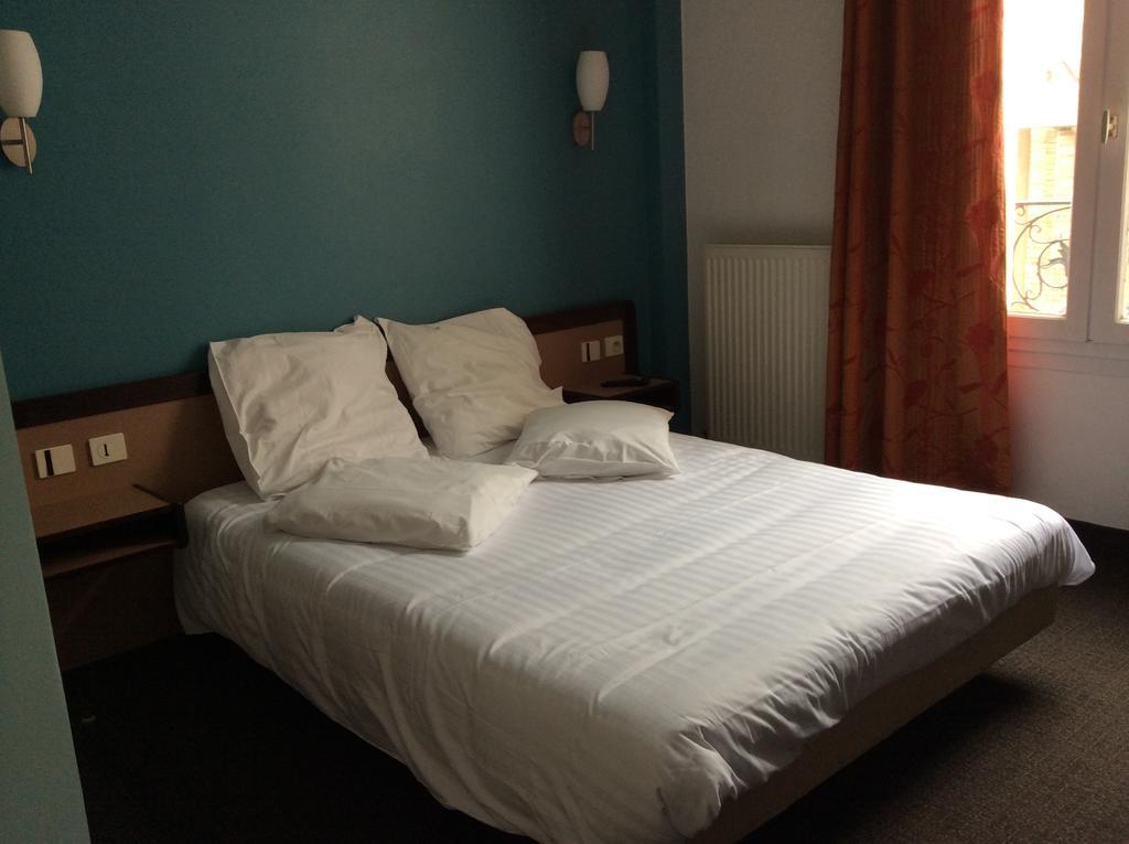 Hotel De La Place Malakoff Pokoj fotografie